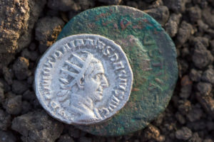 Ancient Roman silver coin showing the portrait of the emperor Ancient Roman silver coin showing the portrait of the emperor